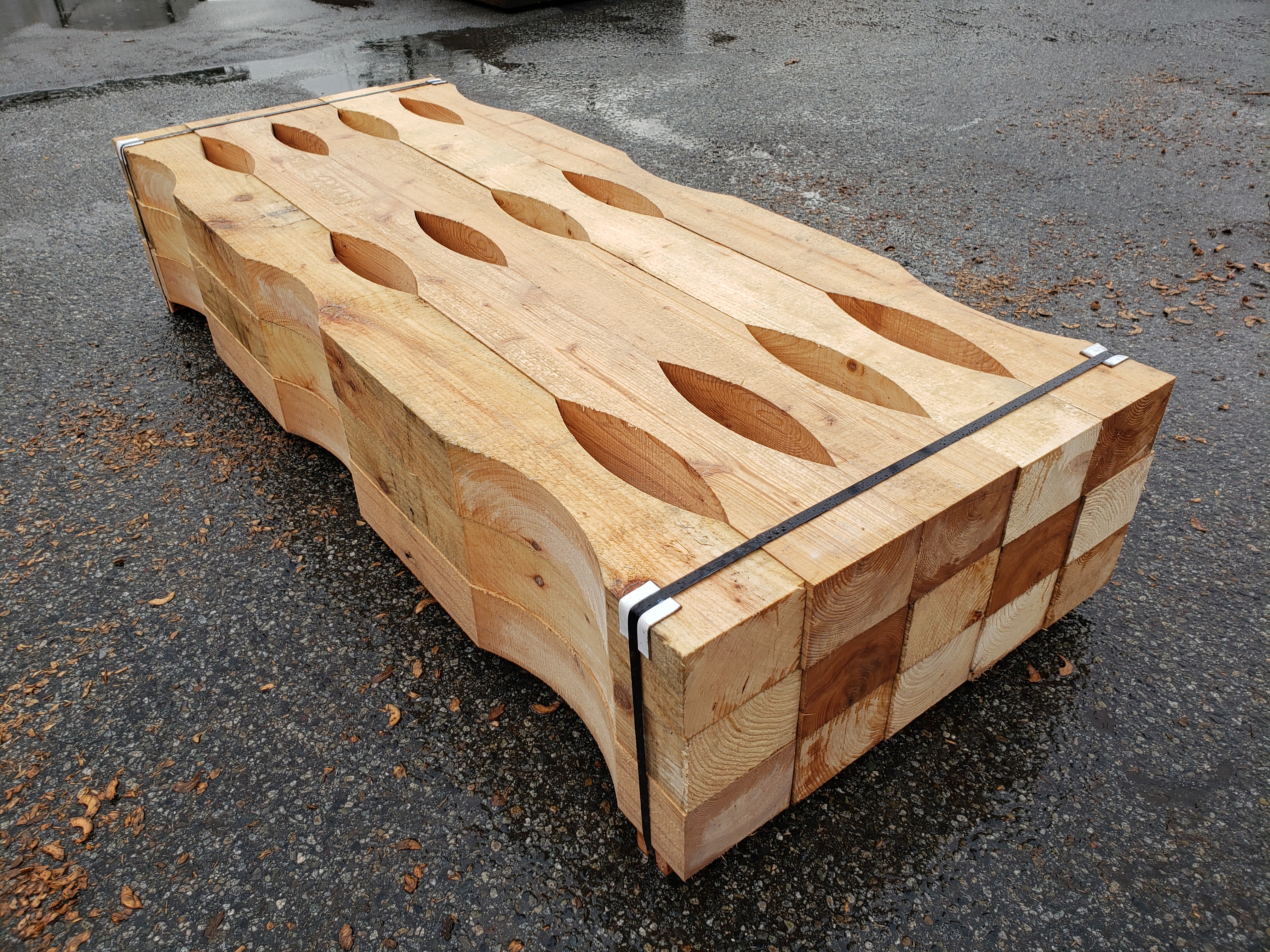 Contoured Dunnage for loading 36″ pipe on trucks Industrial Timber